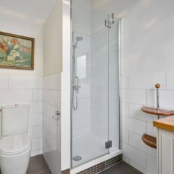 bathroom with shower, cleaning and linens provided in serviced apartment brussels