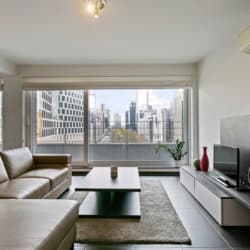 manhattan view two bedroom apartment living space with view down esplanade
