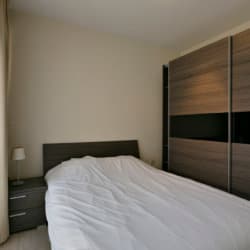 riverside one bedroom apartment master bedroom with large wardrobe