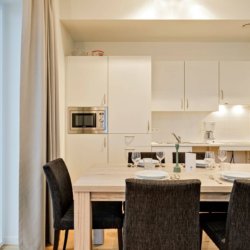 dining room and fully equipped kitchen in bbf serviced apartment antwerp