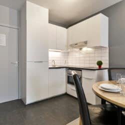 fully equipped kitchen in serviced apartment near european commission