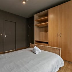 wardrobe with storage in one bedroom serviced apartment in brussels city centre