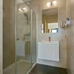 ensuite with shower in three bedroom apartment