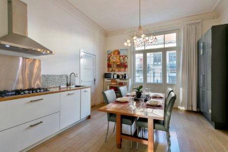 dining room with fully equipped kitchen in brussels