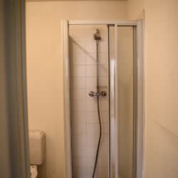 bathroom with shower in unfurnished apartment in clos folon residence south brussels