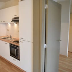 kitchen in unfurnished apartment in clos folon residence south brussels